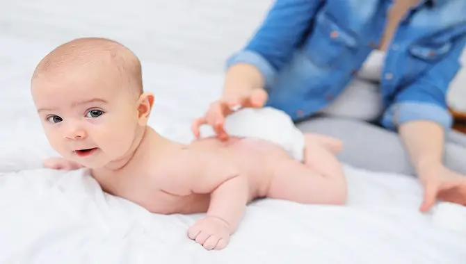 Applying Diaper Cream On Baby Boys